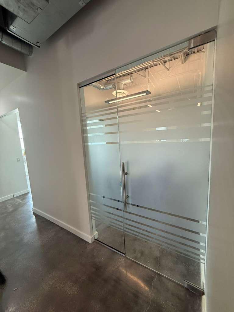 Frosted glass office door installation