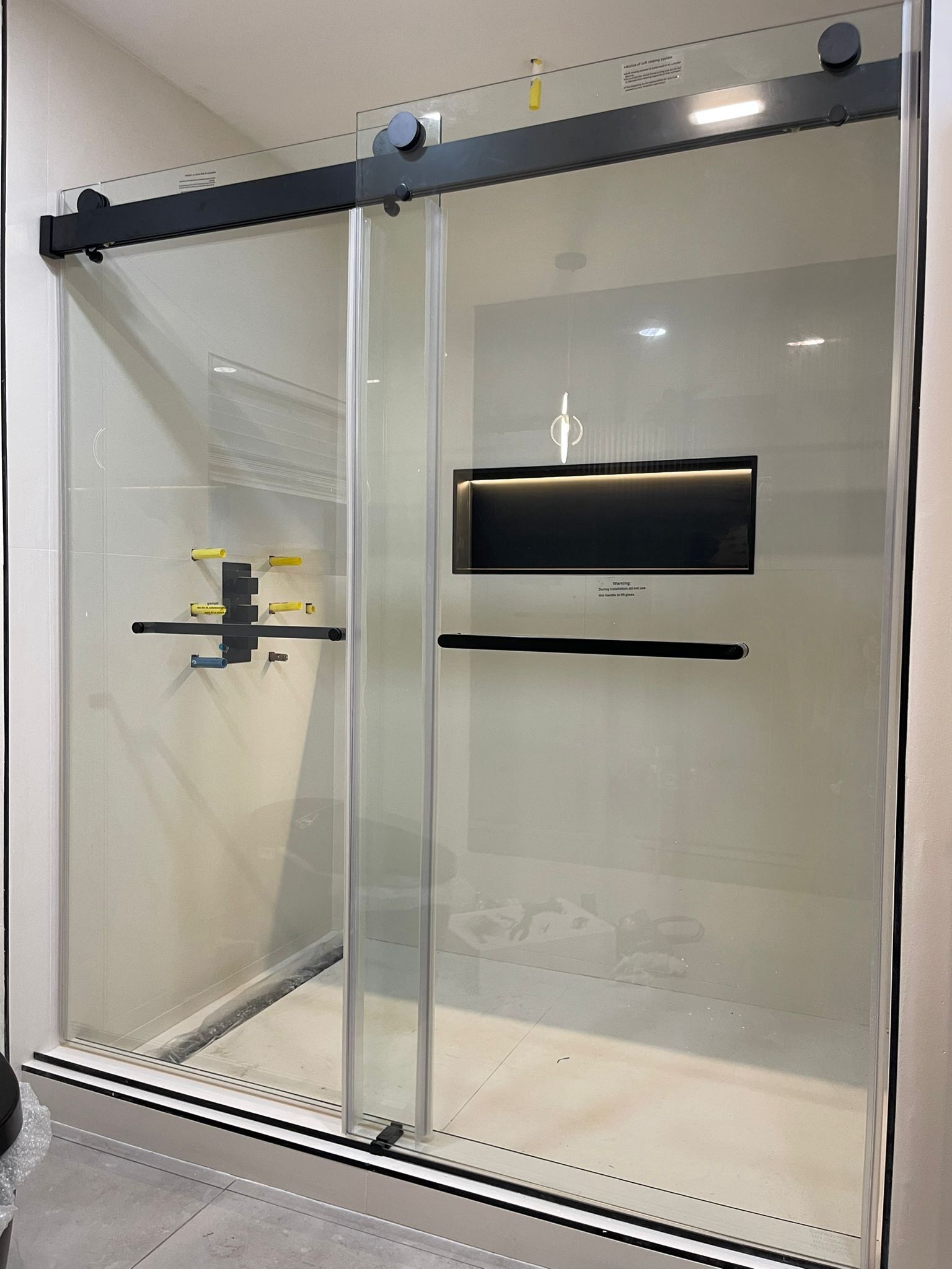 Sliding shower glass door installation