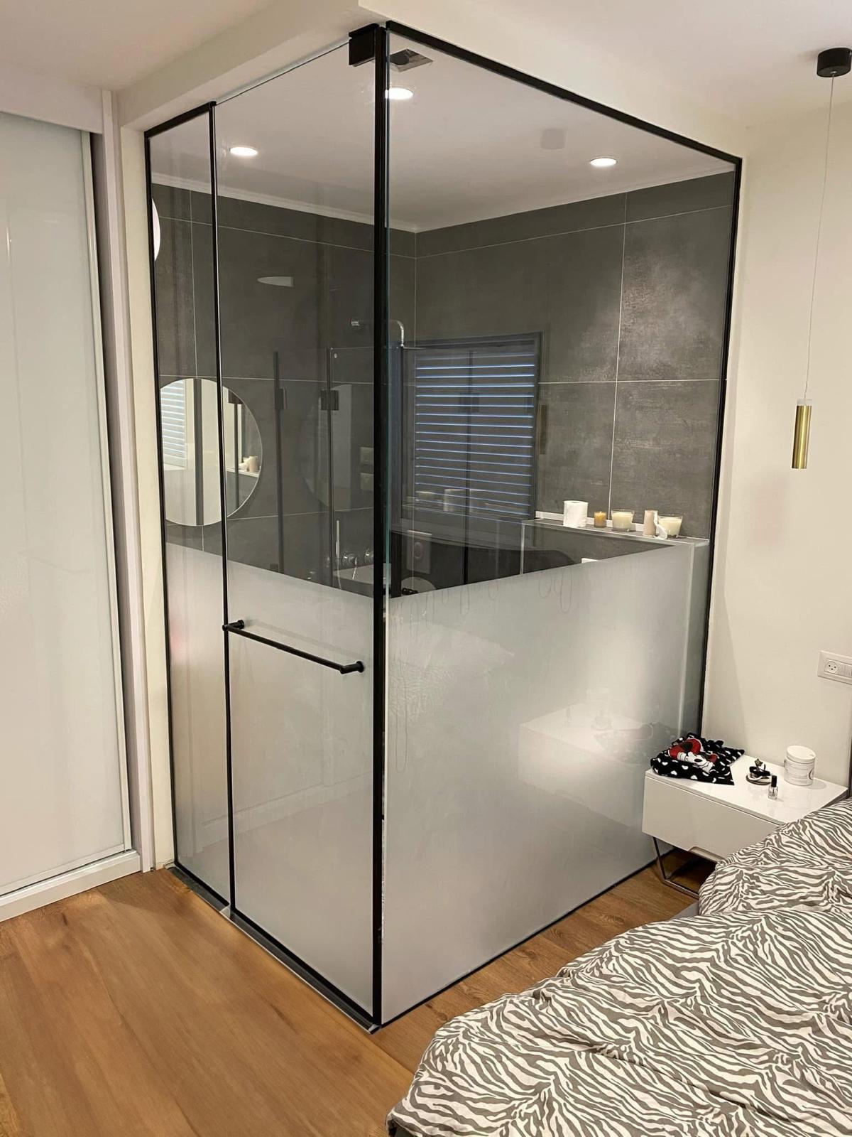 Black framed corner shower glass enclosure