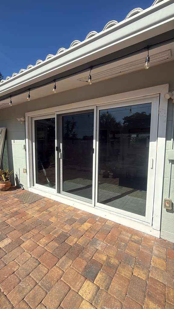 White three-panel patio door glass replacement