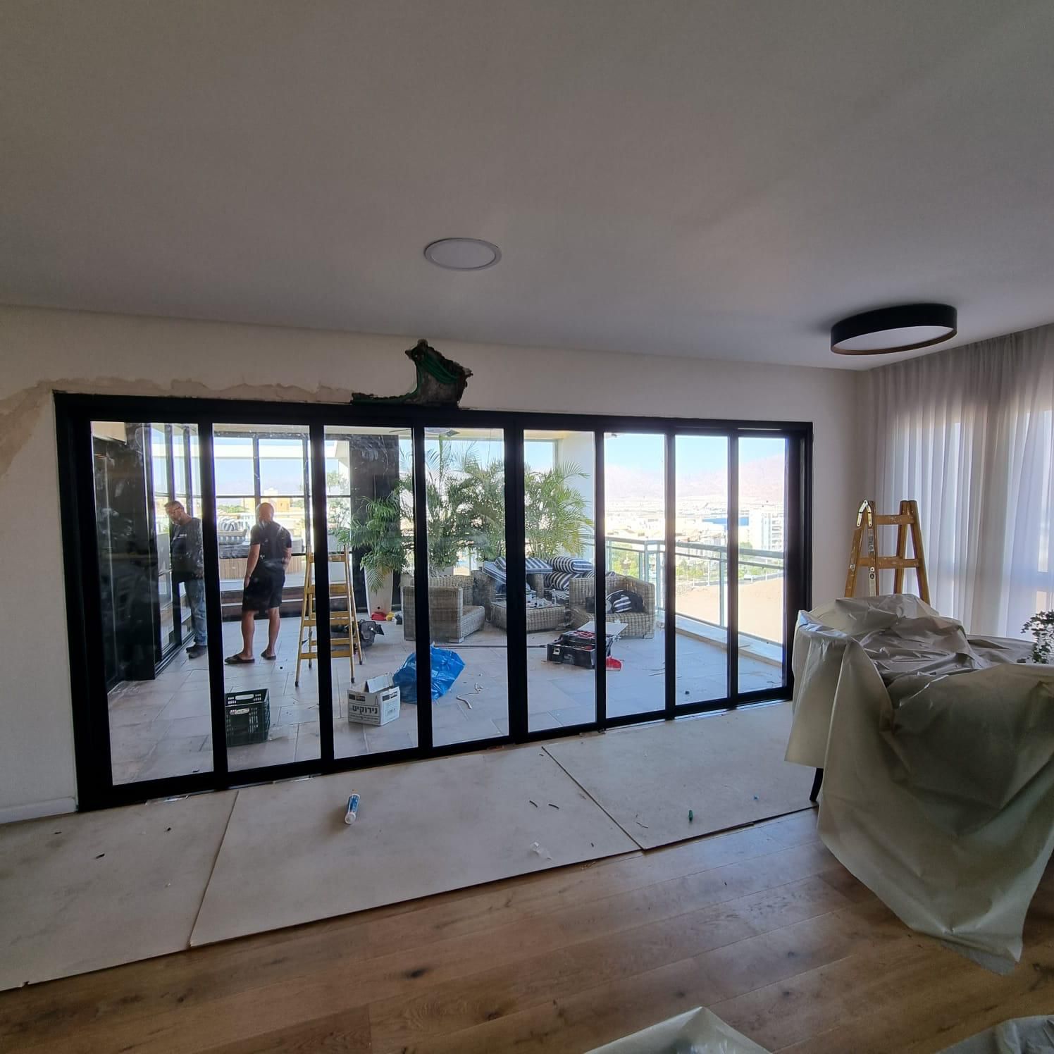 Large multi-panel sliding glass replacement