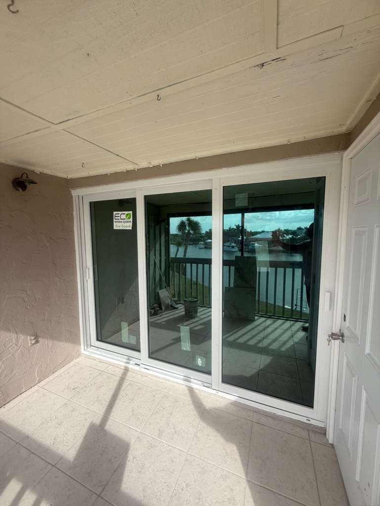 White exterior sliding glass door replacement