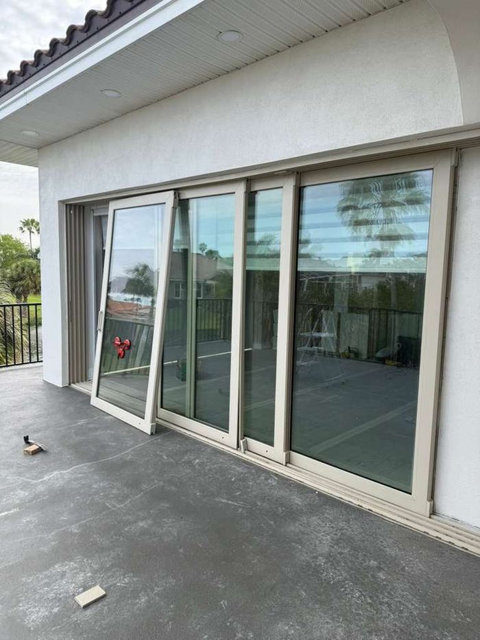 White multi-panel sliding glass door replacement