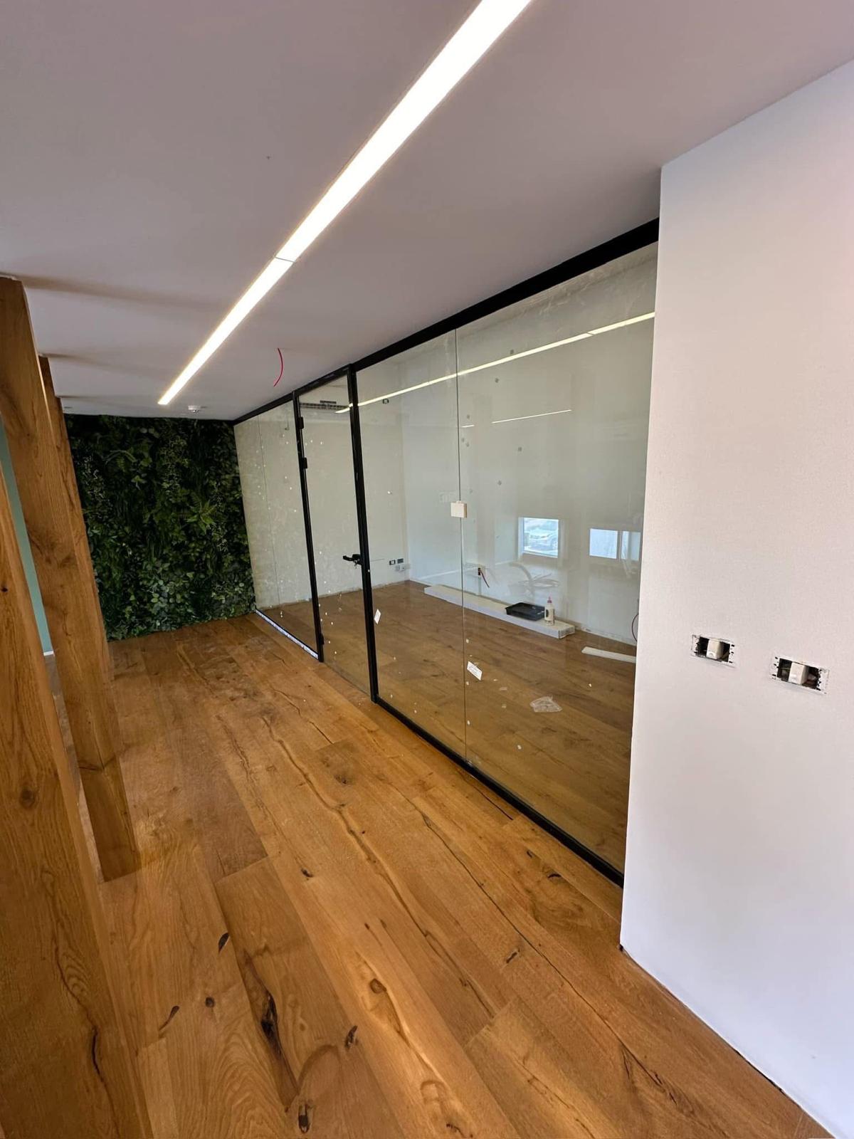 Interior commercial glass wall installation